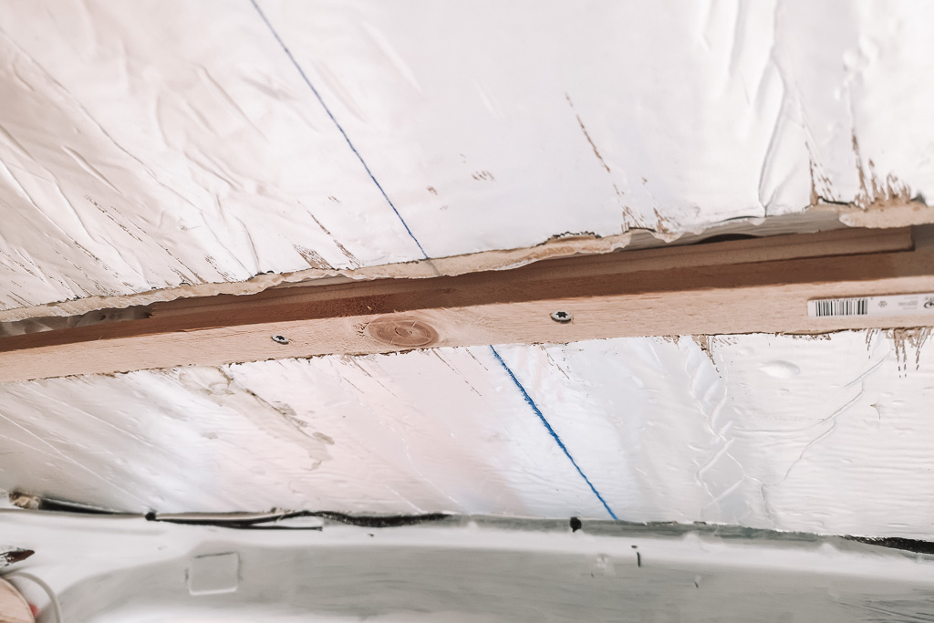 Wooden batons fitted to the ceiling support struts