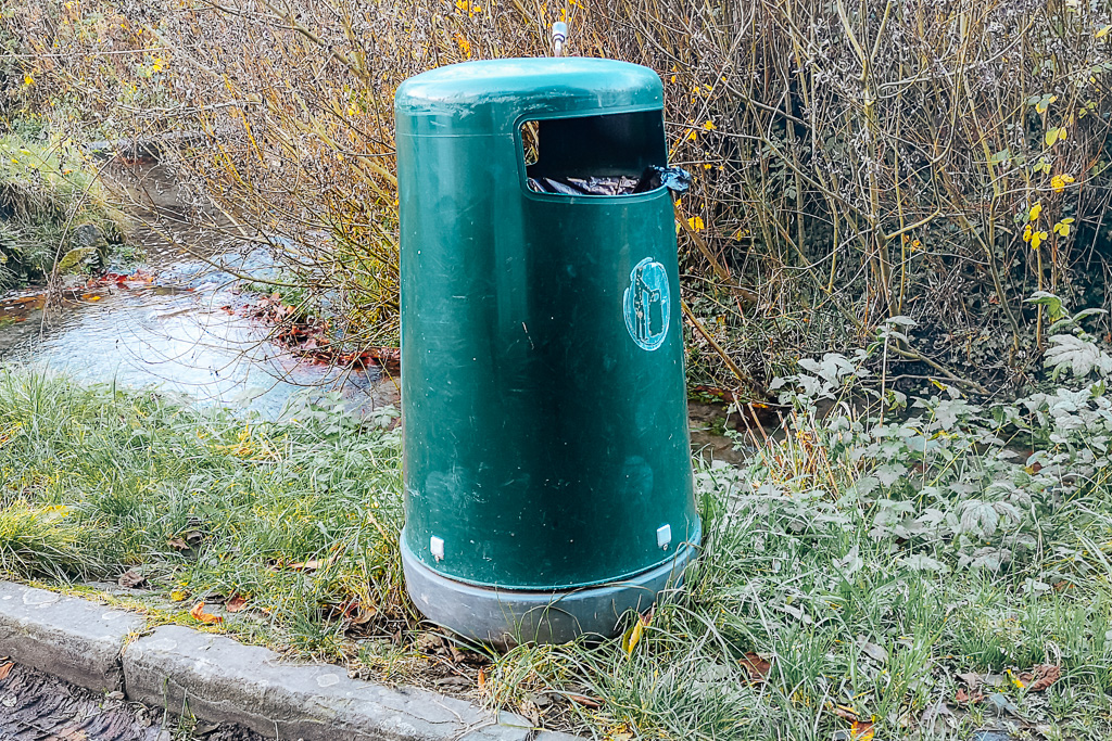 A green waste bin for disposing of compost waste