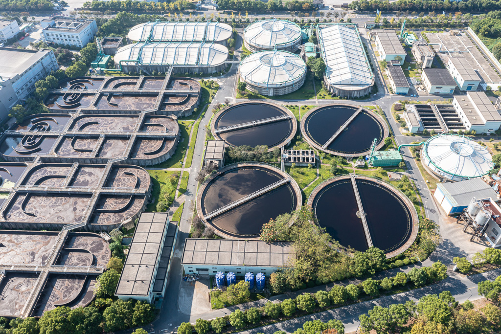 A large sewage plant with four sewage treatment tanks