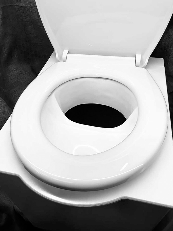 A urine diverter in a compost campervan toilet
